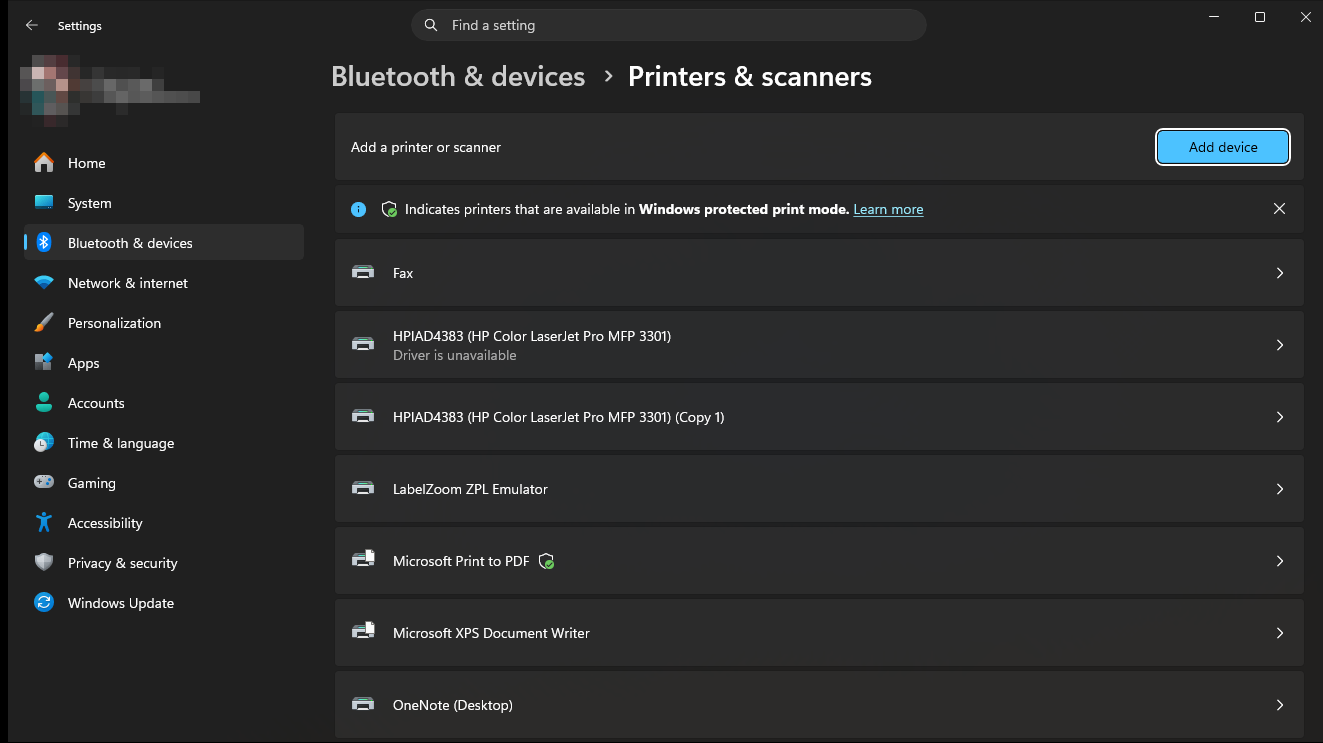 The Windows 11 Printers &amp; scanners settings page, with the Add device button at the top of the printer list